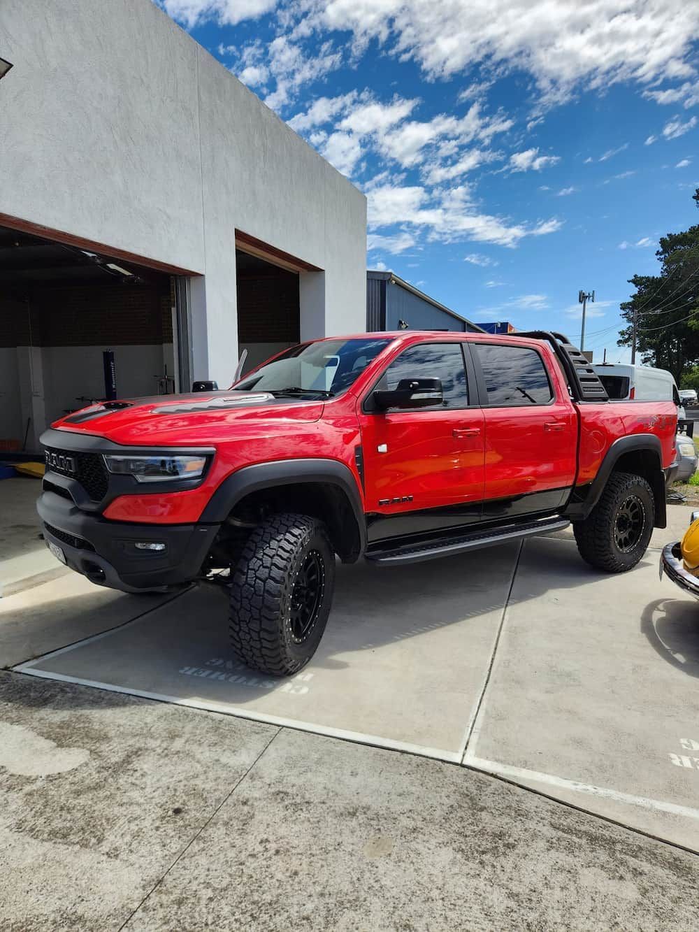 Red Ram Trx Pickup Truck Parked Outside a Building — COOTA Automotive Services in Ballarat East, VIC