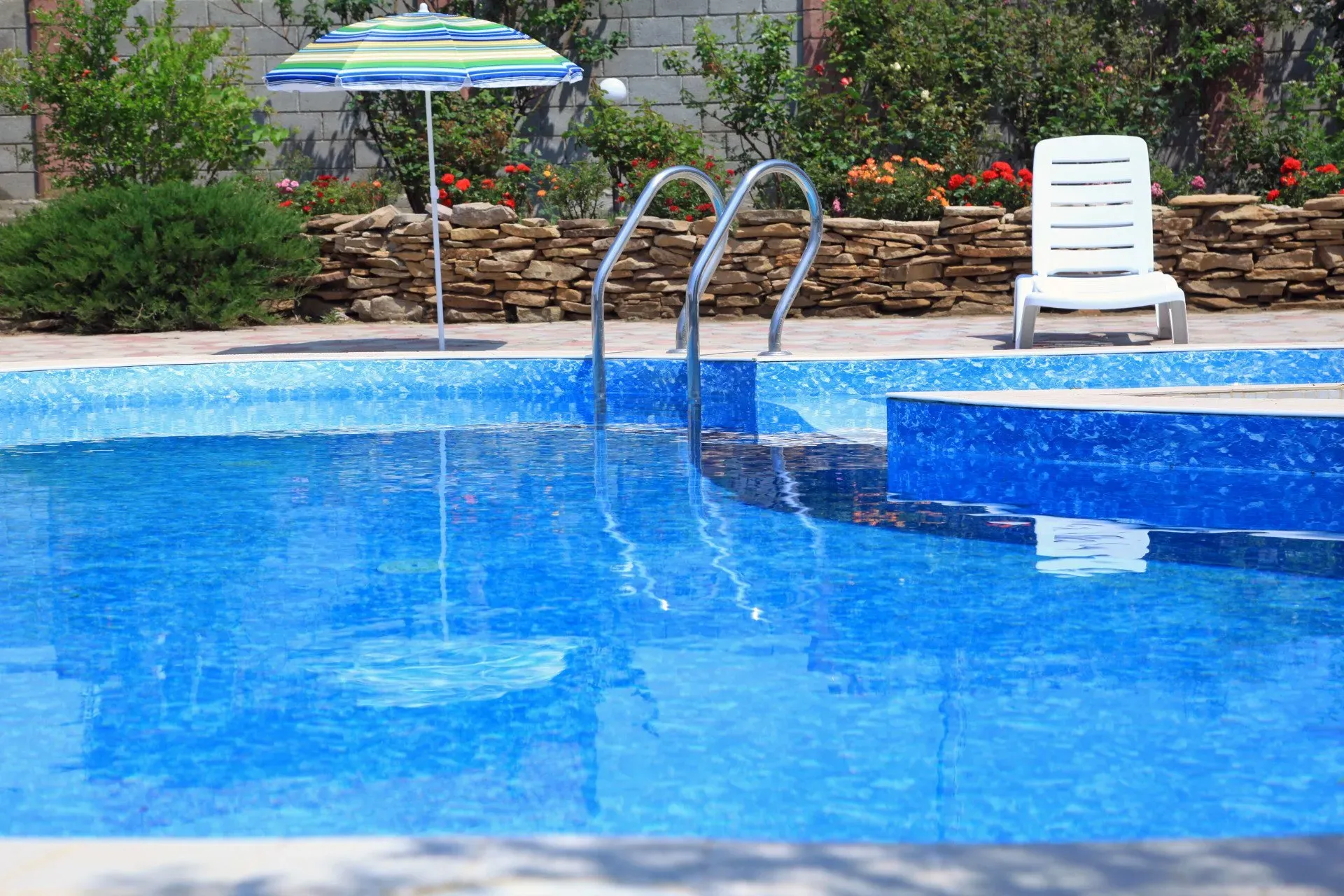 Pool with ladder — Ponca City, Oklahoma — Village Green Apartments Pool with ladder — Ponca City, Oklahoma — Village Green Apartments