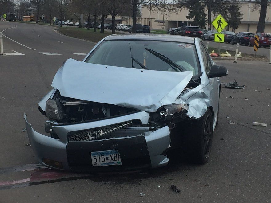 Picture of a junk car in minneapolis, MN.