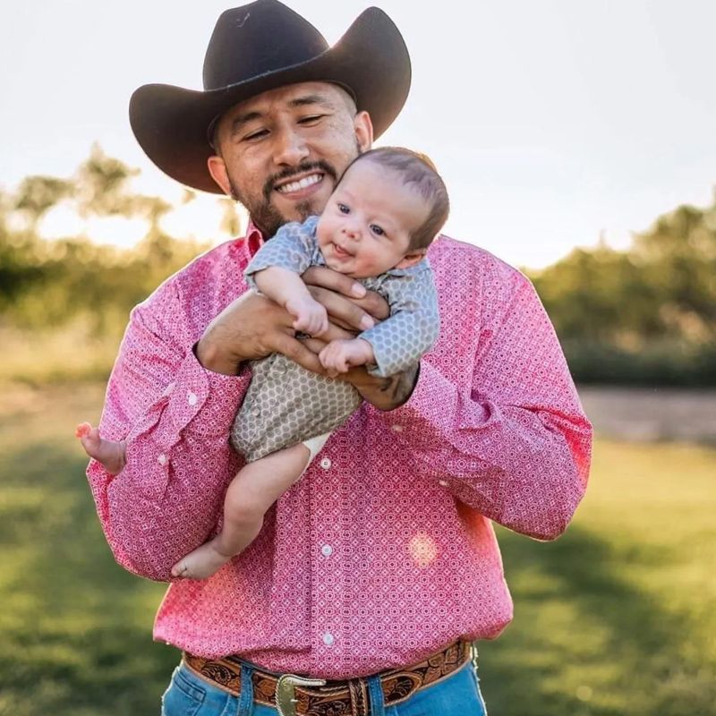 Man Holding A Child