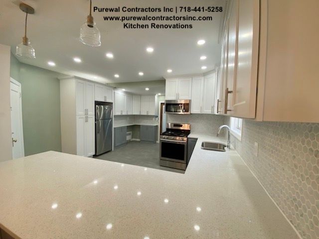 Contemporary Kitchen Remodel by Purewal Contractors Inc. project photo 3
