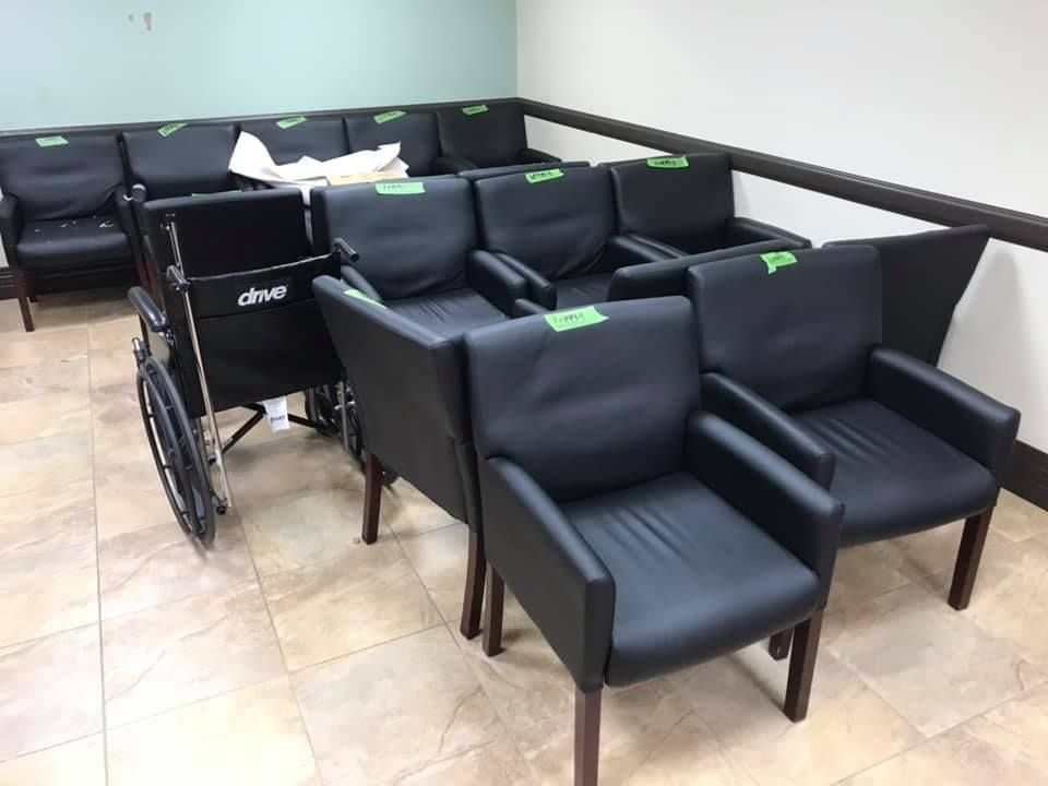 A row of chairs and a wheelchair in a waiting room 28.4845° N, 81.2519° W