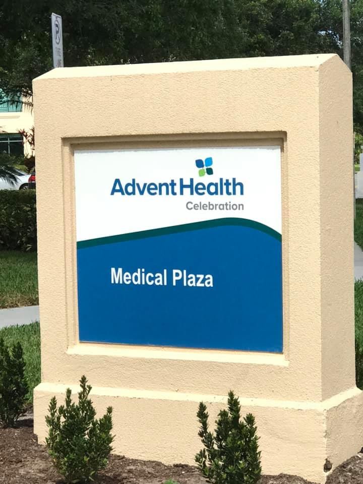 A sign for advent health celebration medical plaza 28.4845° N, 81.2519° W