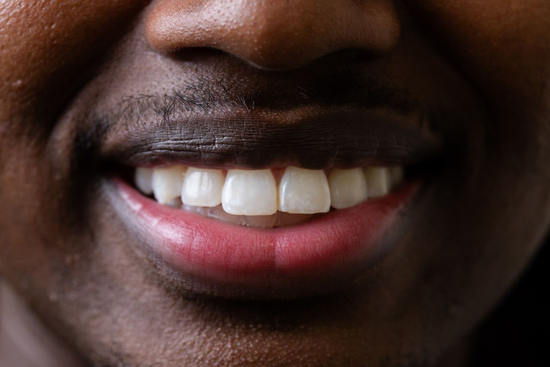 Close view of a bright, even smile at GEN2 Dentistry
