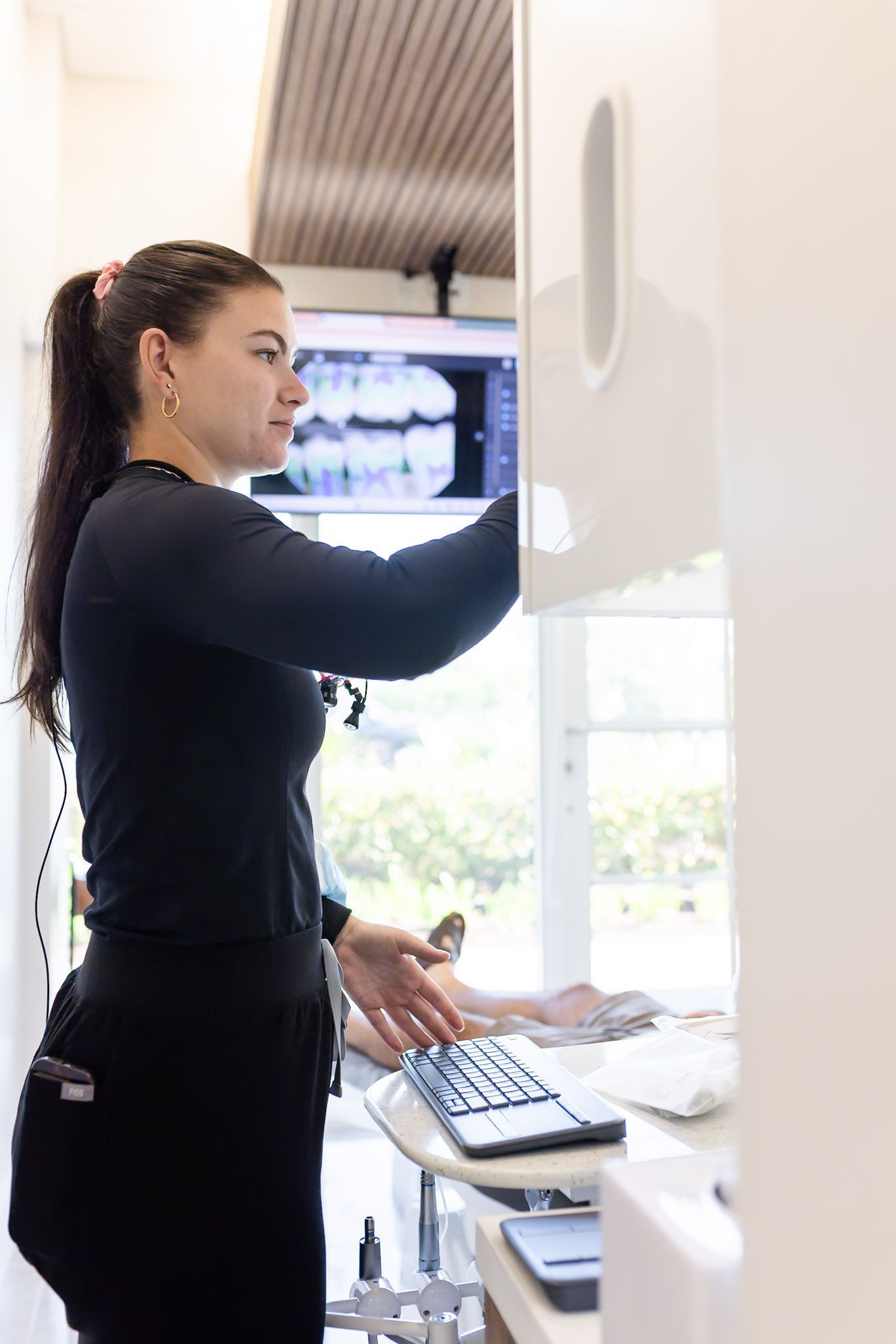Team member working at the imaging station during a crown visit