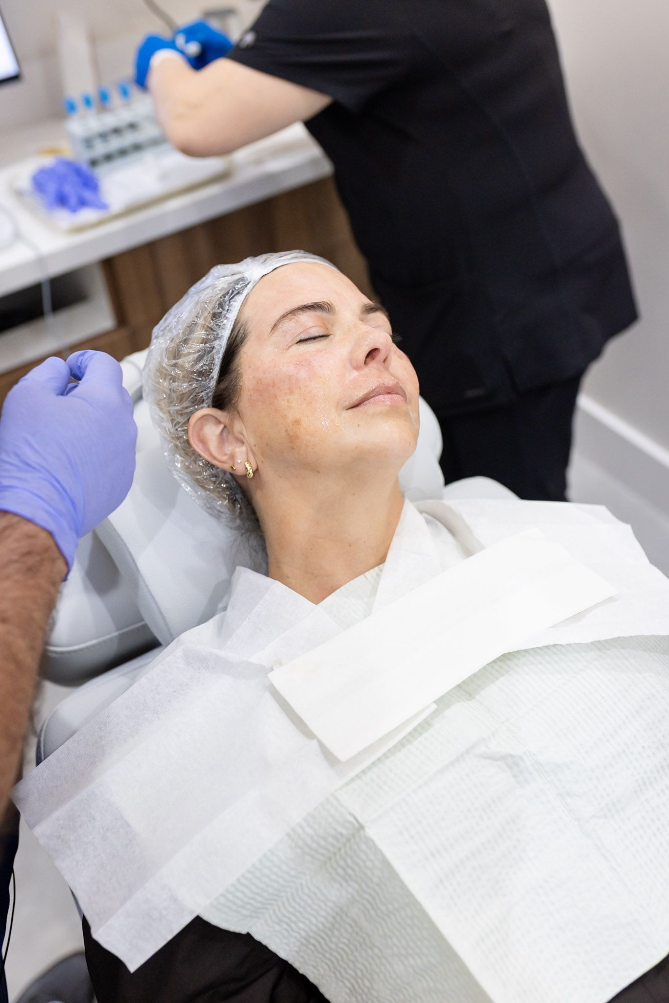 Patient resting comfortably during PRF microneedling at GEN2 Dentistry