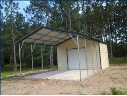 Small beige shed with a metal carport