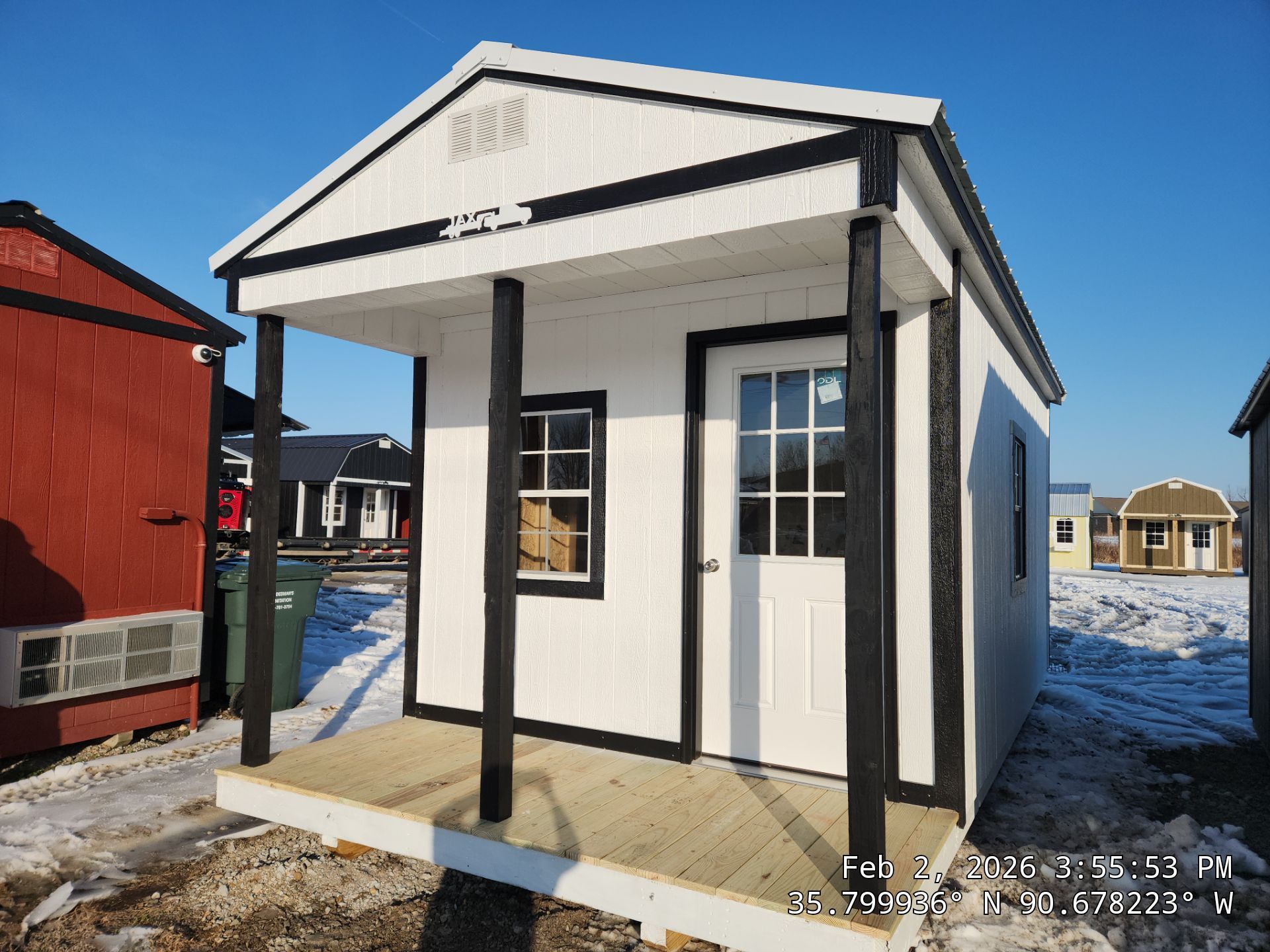 white cabin with black trim