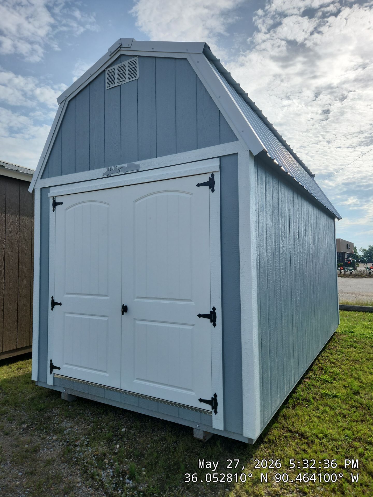 gray lofted barn with double doors