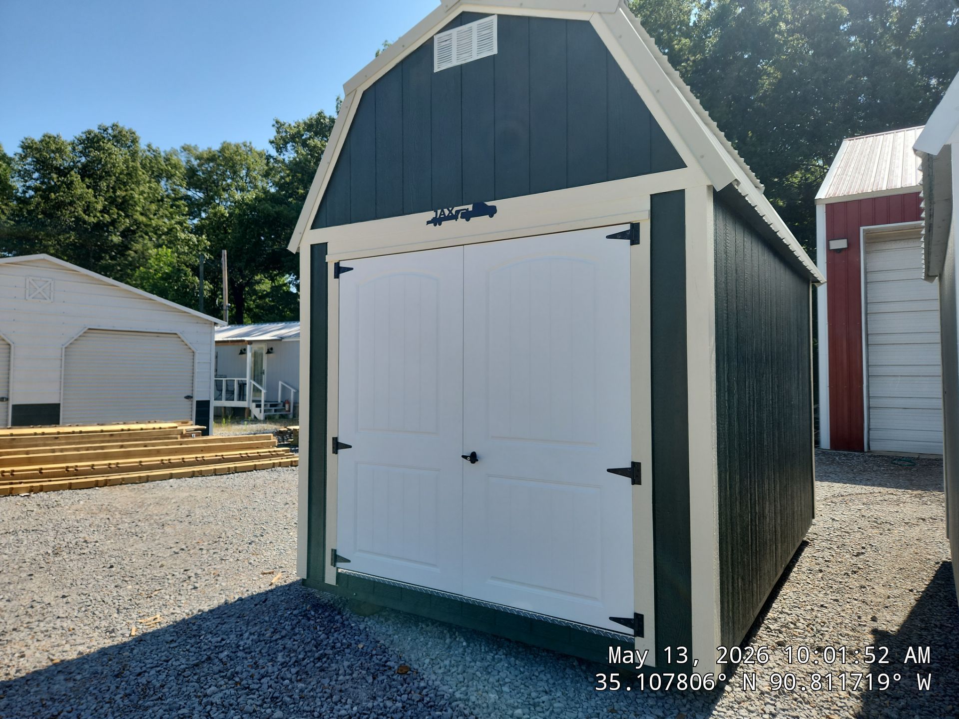 blue lofted barn with double doors