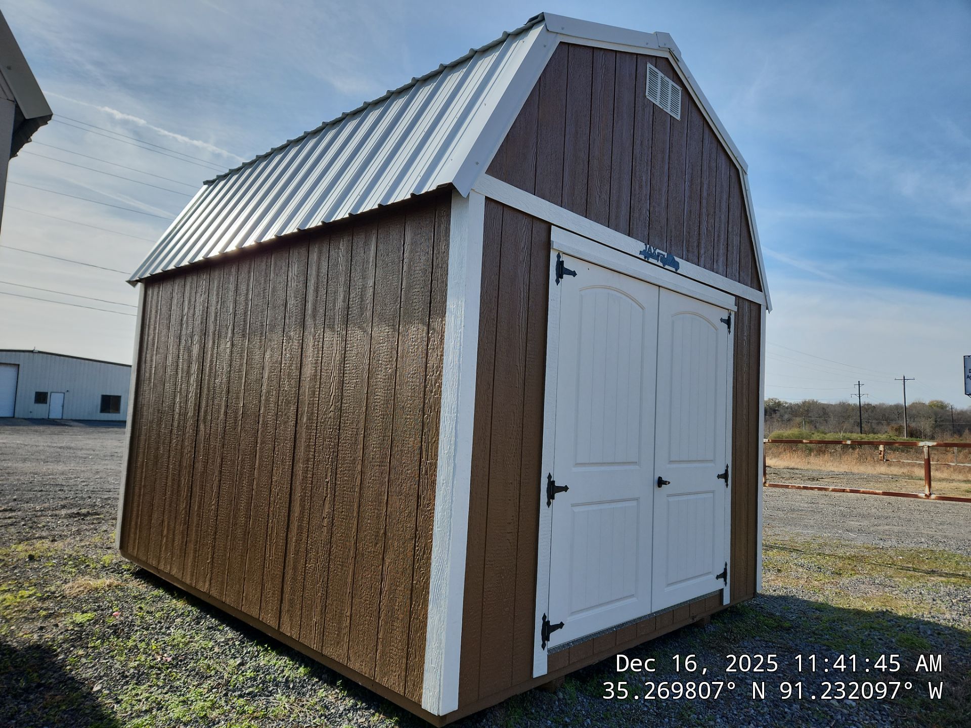 brown lofted barn with double doors