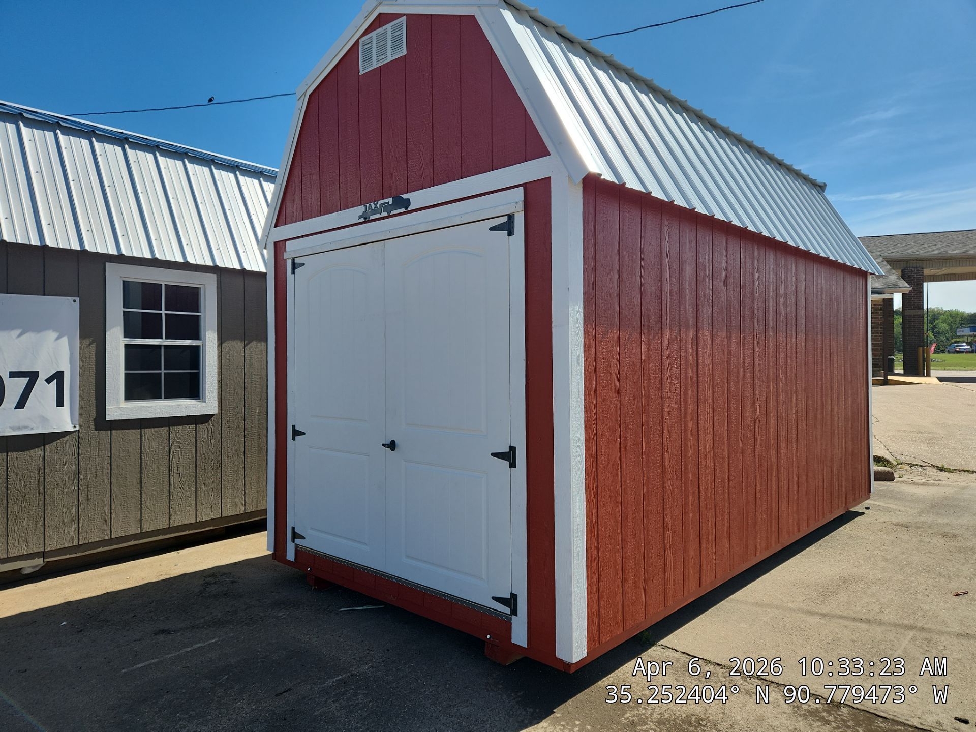red lofted barn with double doors