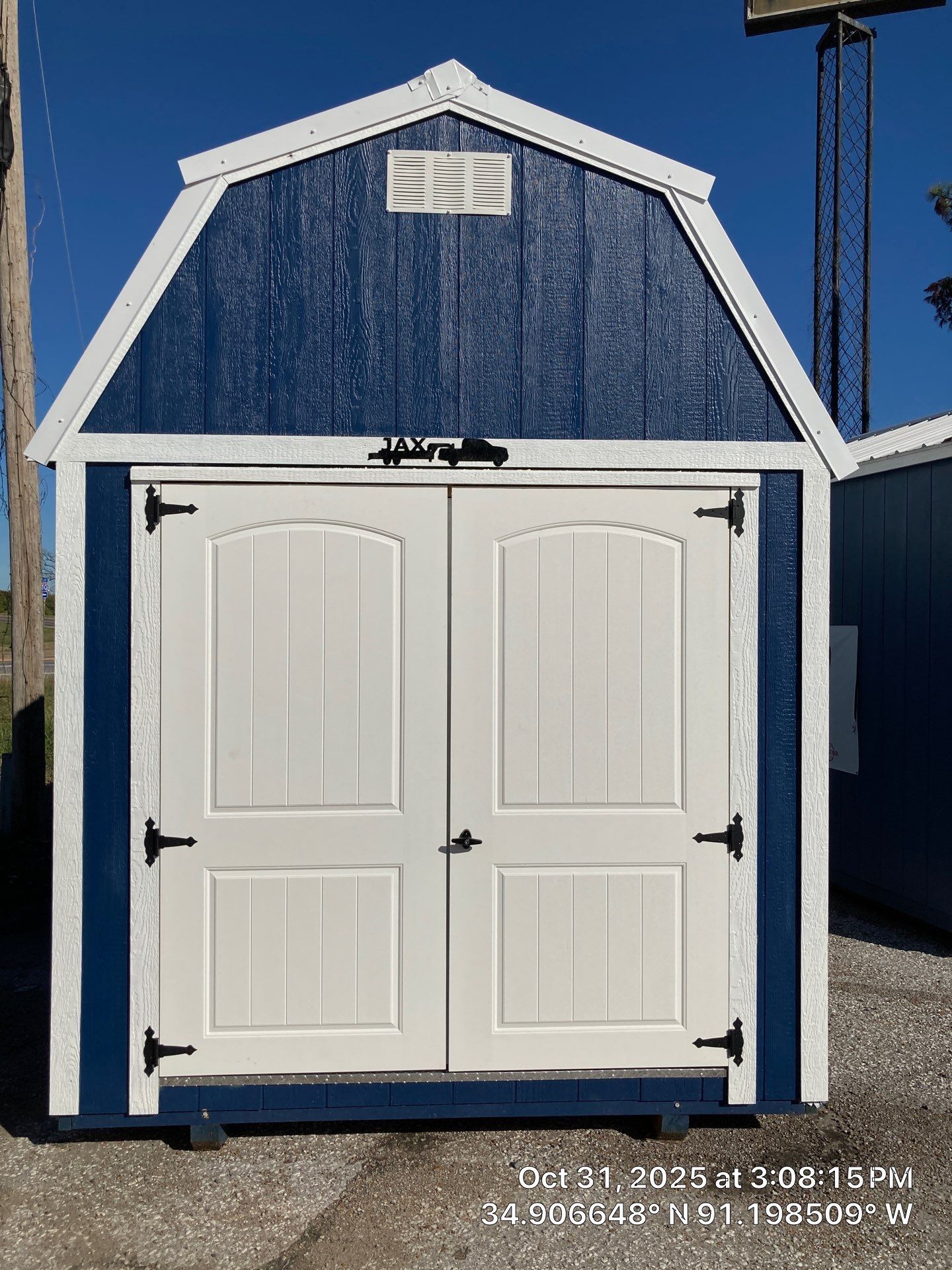 blue lofted barn with double doors