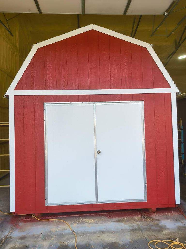 red lofted barn with double doors
