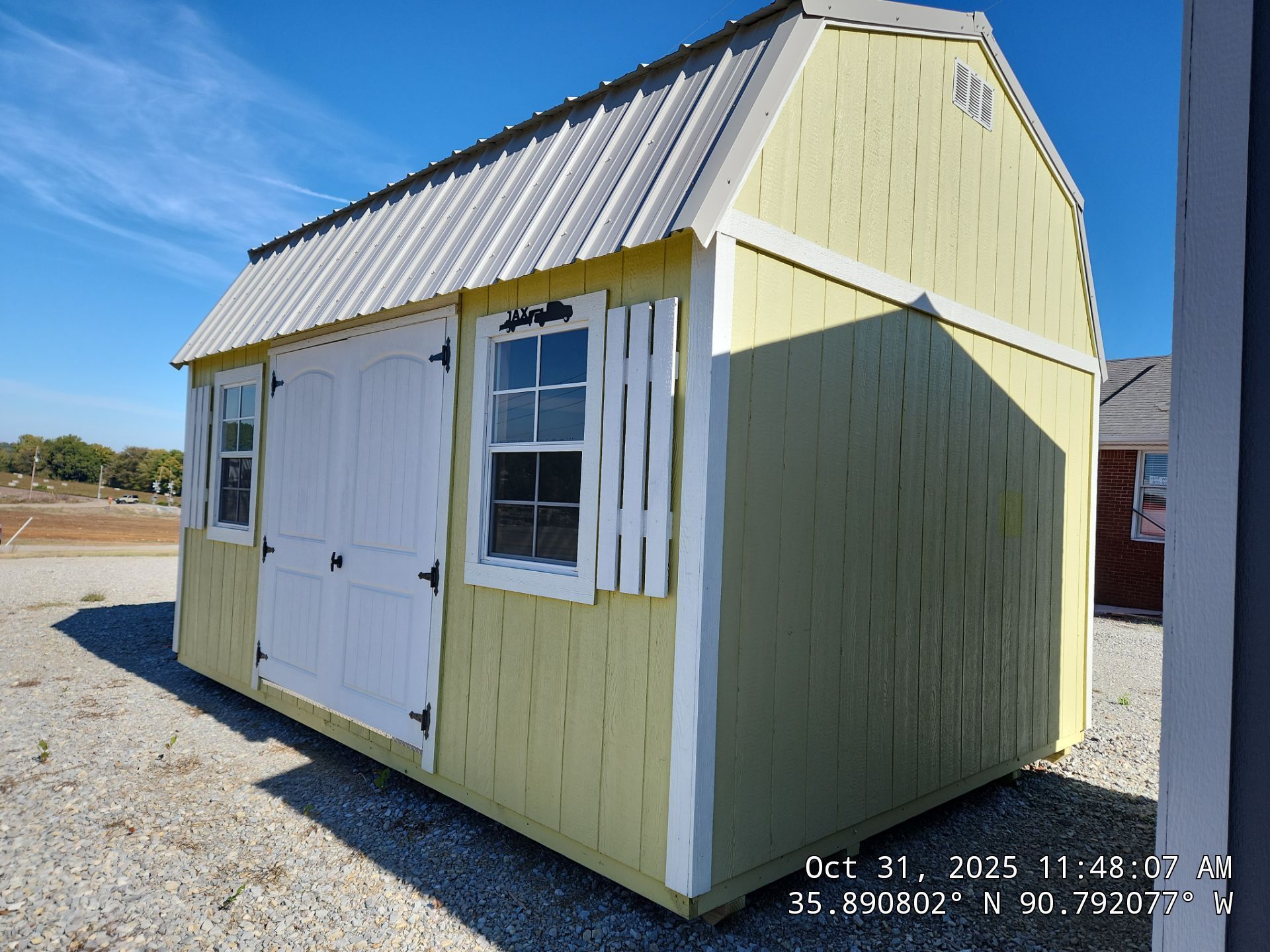 yellow side lofted barn