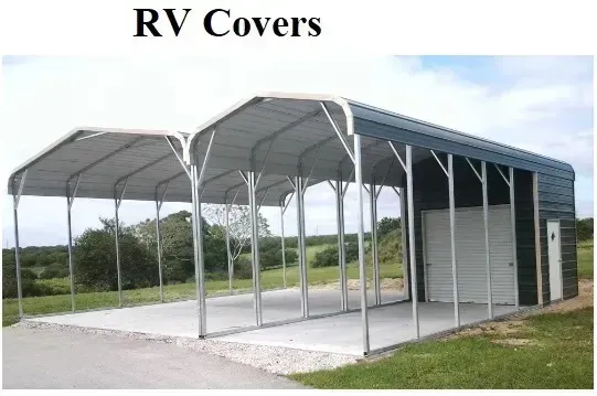 RV covers: gray metal carport shelter over parked RVs beside a road and open field