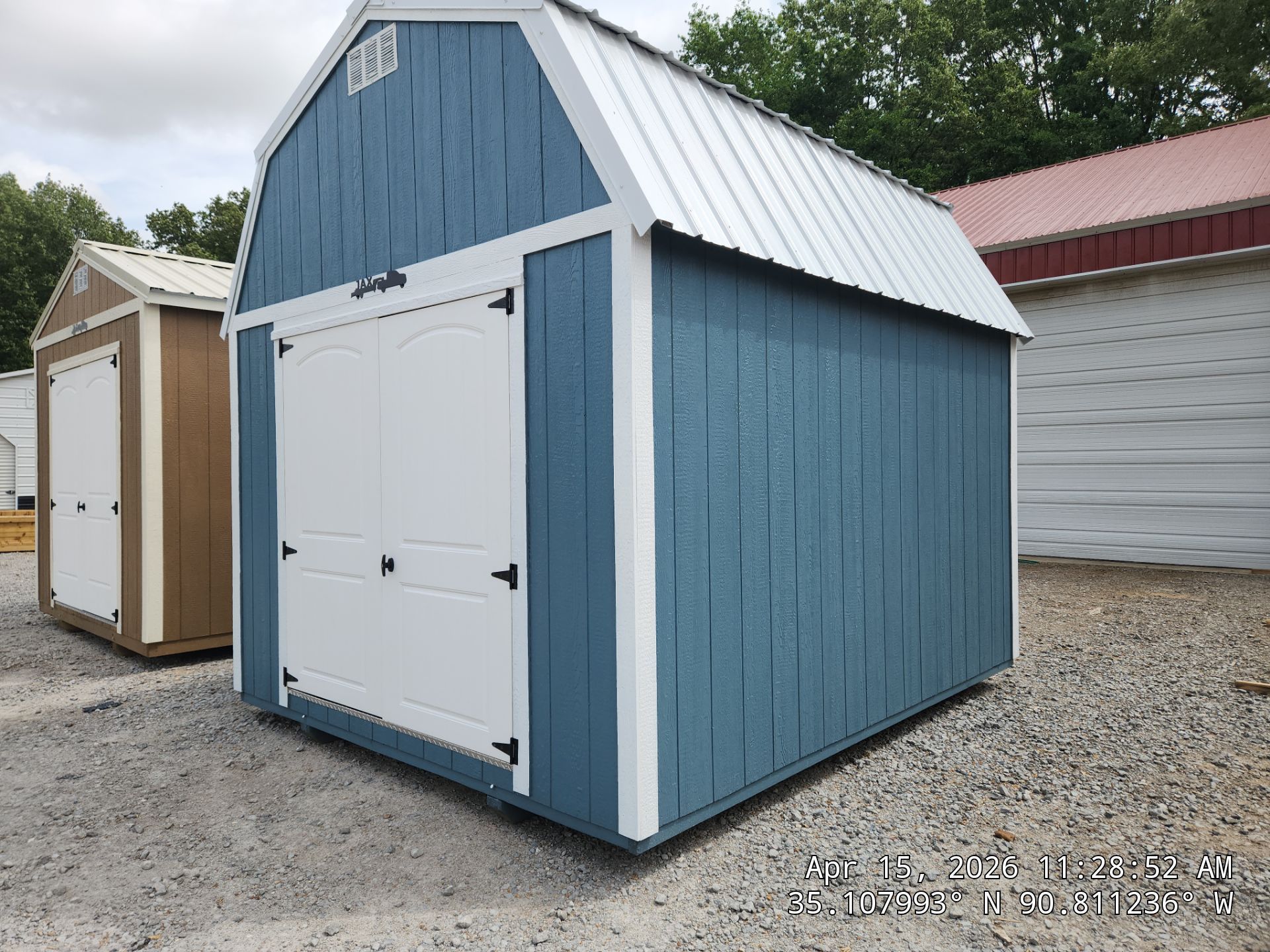 blue lofted barn with double doors