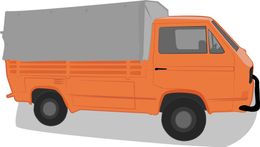 Orange Volkswagen pickup truck with a gray tarp covering the cargo bed.