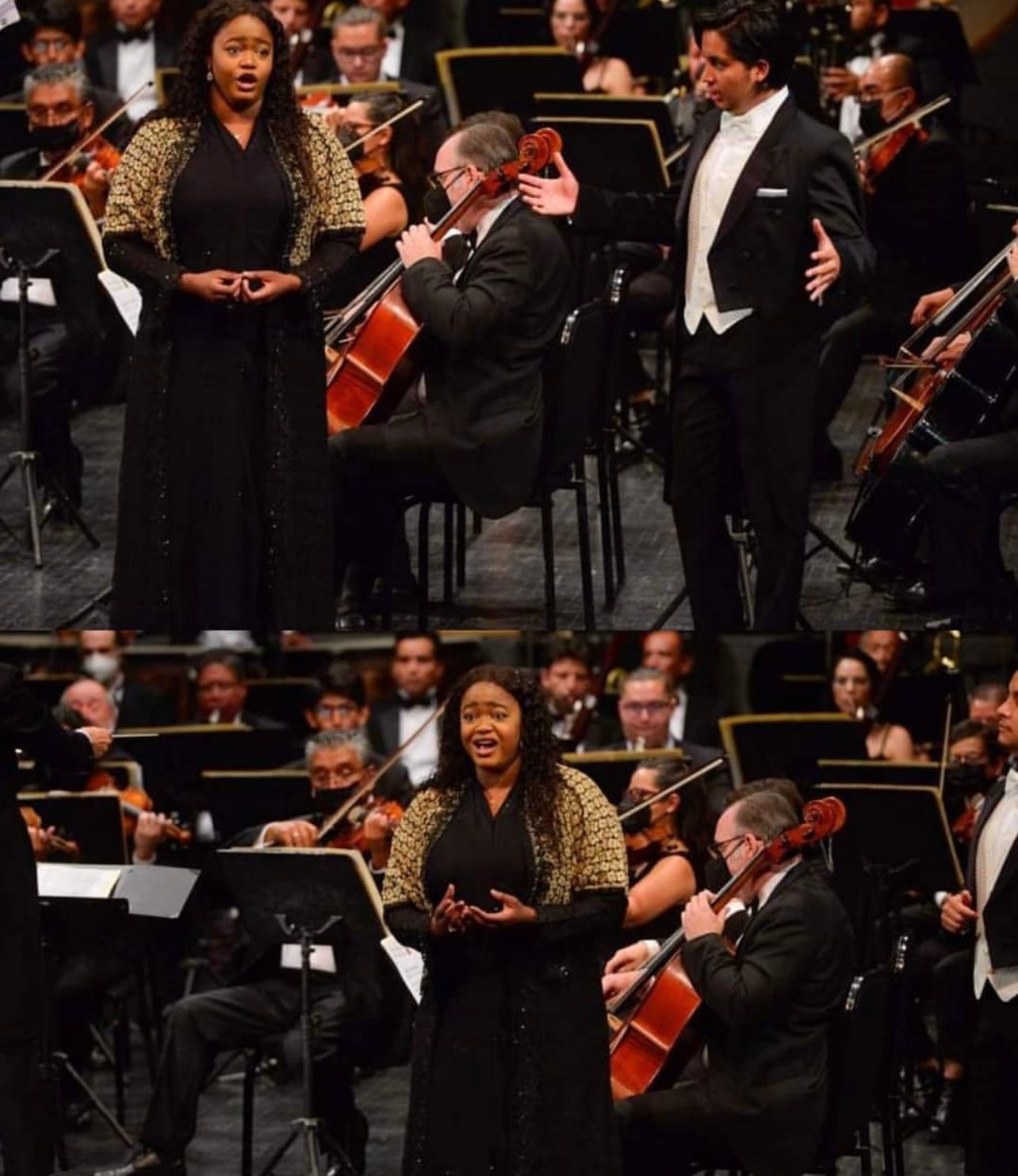 Opera singers performing with orchestra on stage, one in black dress and one in tuxedo.