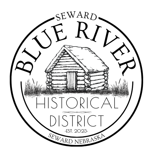 Blue River Historical District logo featuring a log cabin, Seward Nebraska.