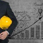 Businessman holding yellow cap. Problems and solution sketch