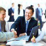 Business people shaking hands, finishing up a meeting