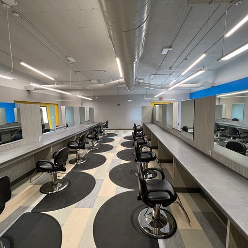 A large room with a lot of chairs and tables