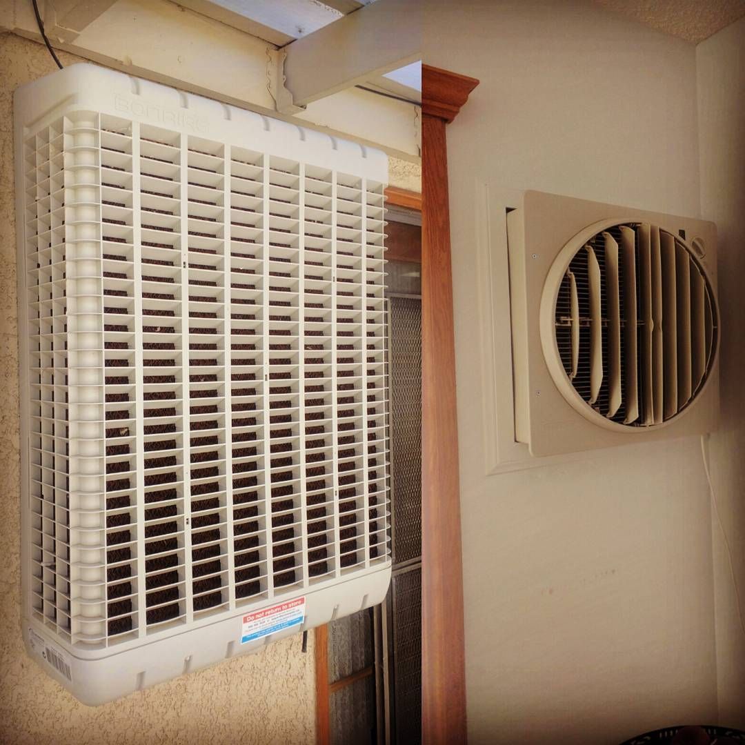 Two wall-mounted air vents, one white louvered and one round beige fan vent, beside a window with blinds