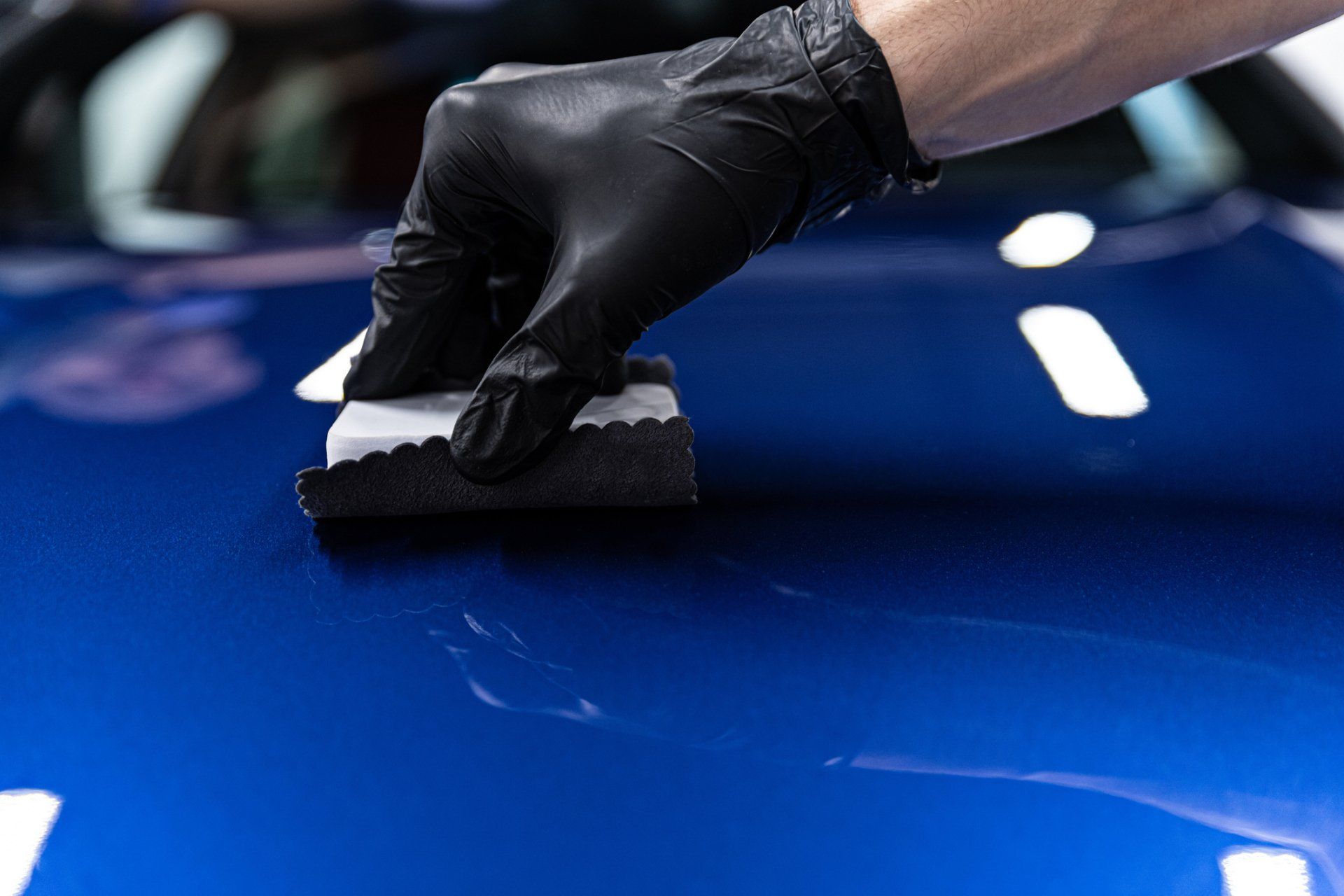 ceramic coating paint enhancement on a blue car