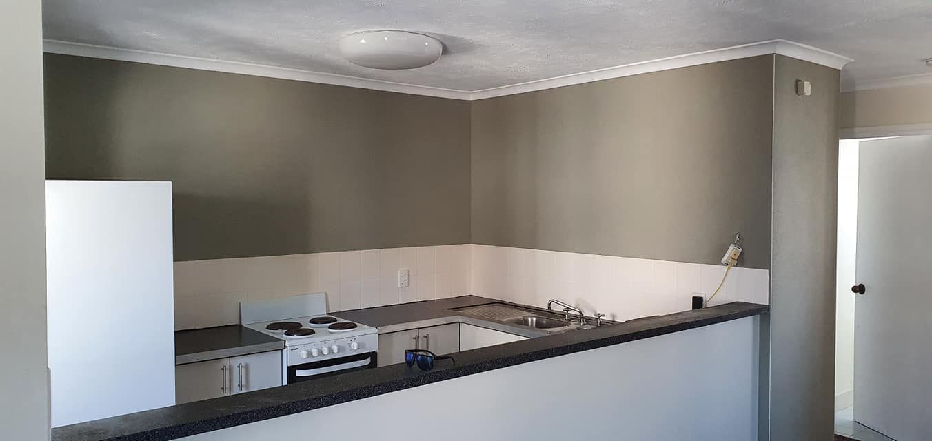 A White Door is Open in an Empty Room With a Blue Wall — MJ Render in Buderim, QLD