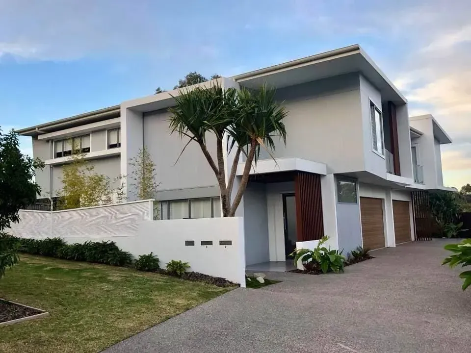 A Large House with A Tree in Front of It  — MJ Render in Buderim, QLD