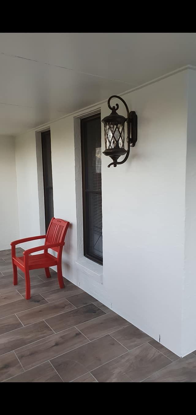 A Red Chair Is Sitting on A Porch Next to A Window — MJ Render in Buderim, QLD