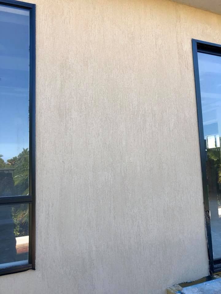 There Are Two Windows on The Side of A Building — MJ Render in Buderim, QLD