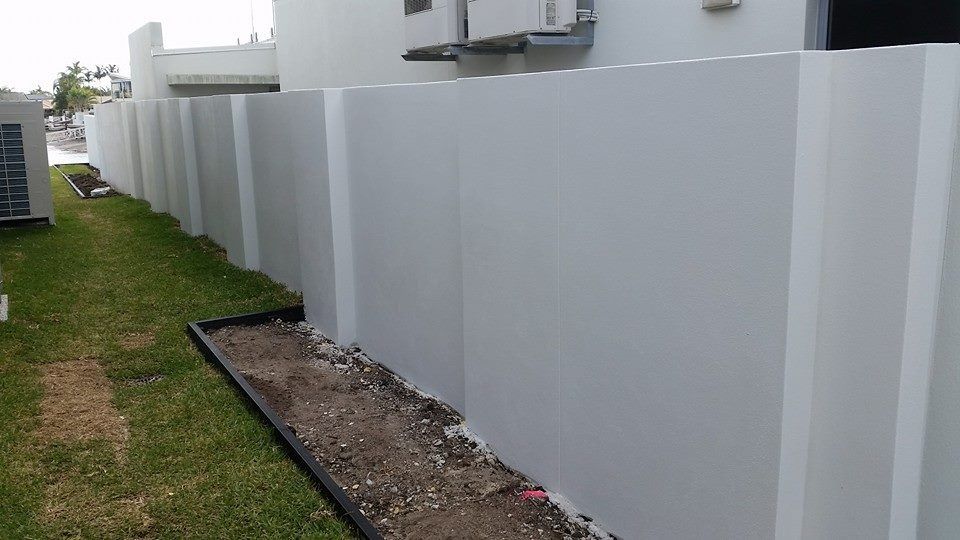 A White Fence Is in The Backyard of A House — MJ Render in Buderim, QLD