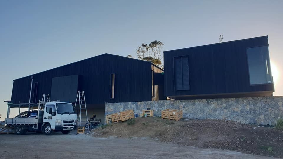 A White Truck Is Parked in Front of A Building Under Construction — MJ Render in Buderim, QLD