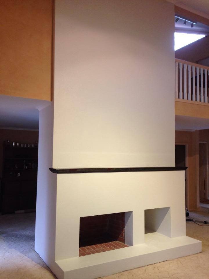 A White Fireplace in A Room with A Balcony — MJ Render in Buderim, QLD