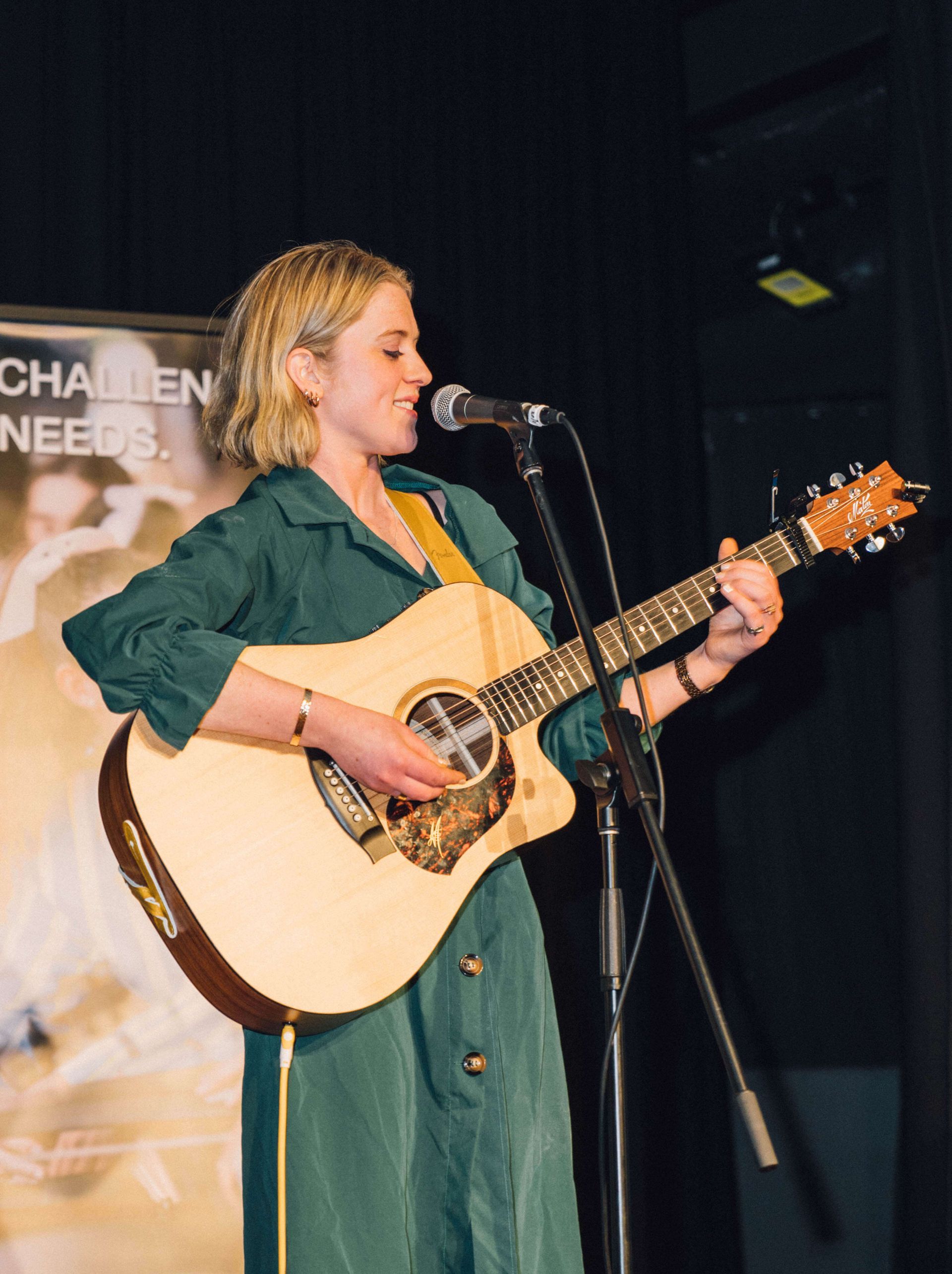 Melbourne singer performing at rooftop party