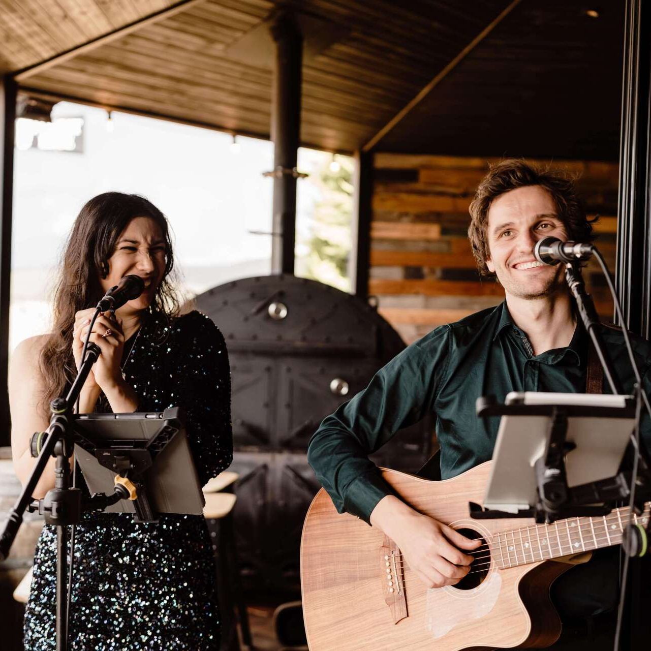 DJ and live musician performing together at a Melbourne party