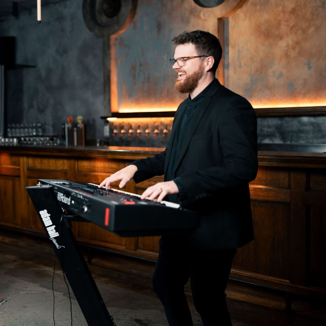 Melbourne pianist and DJ Jack performing at a wedding reception