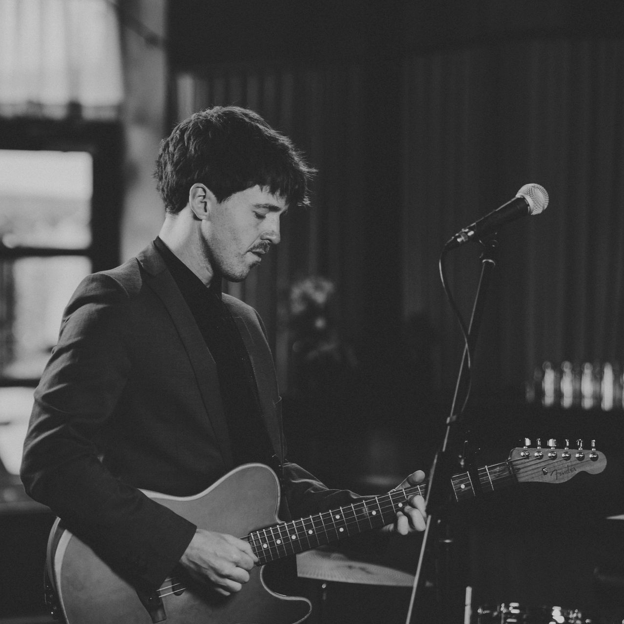 Adelaide acoustic musician playing guitar and singing at a winery wedding in the Barossa Valley