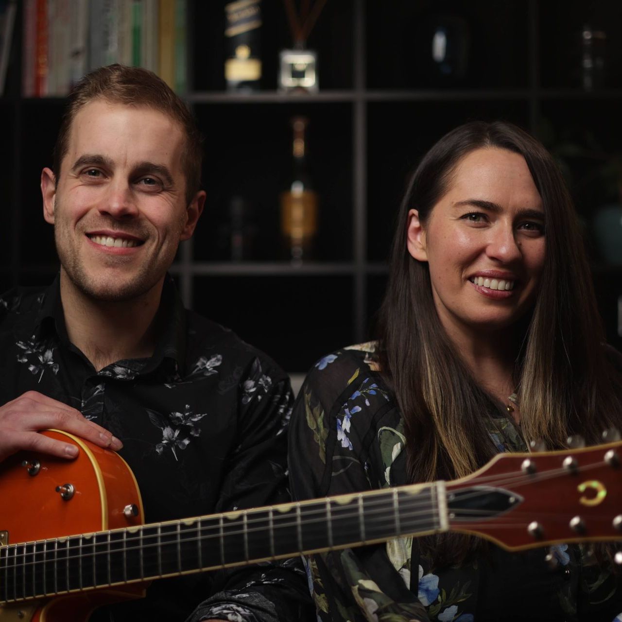Acoustic duo singing harmonies at Melbourne venue