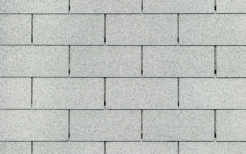 A close up of a white brick wall.