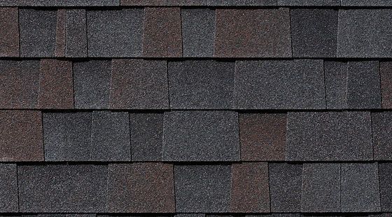 A close up of a row of shingles on a roof.