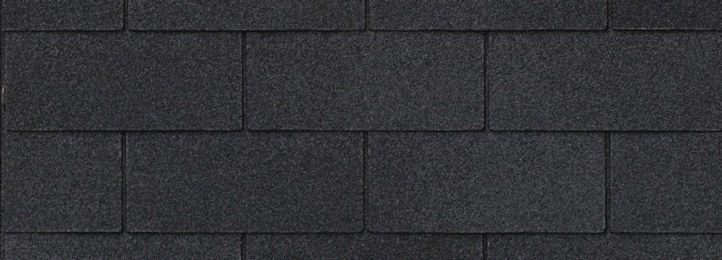 Dark gray shingle roof texture with a repeating horizontal pattern