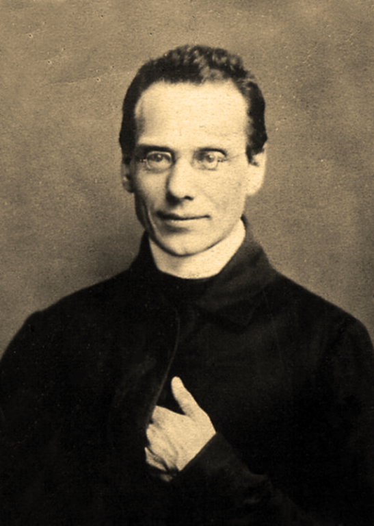 Sepia portrait of a man in a dark coat, facing forward with one hand raised to his chest.