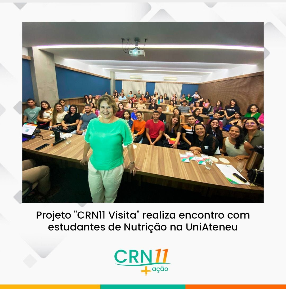 Grupo em sala de aula com professora à frente; texto sobre visita do projeto CRNI aos estudantes de Nutrição na UniAteneu