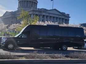 WHITE TUXEDO LIMO BUS - F-550