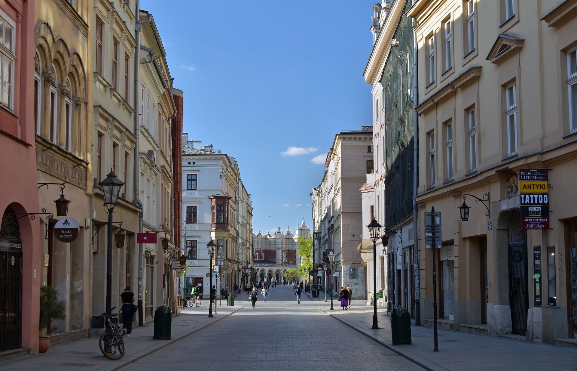 Grodzka Street in Krakow Old Town leading towards the Main Market Square.