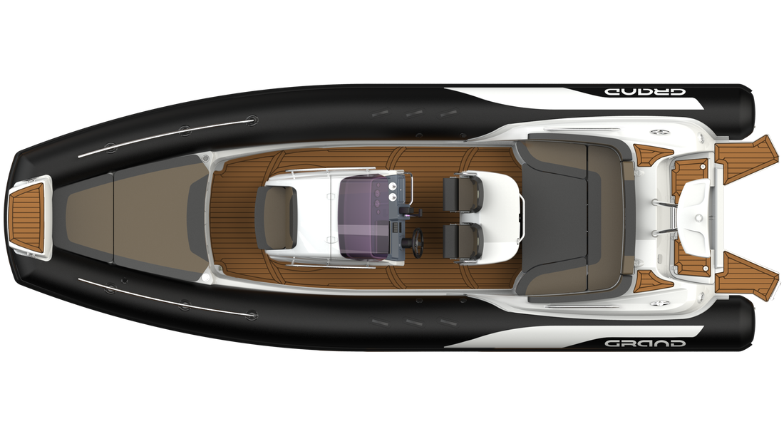 Top-down view of a sleek black and tan motor yacht with a white seating area on deck