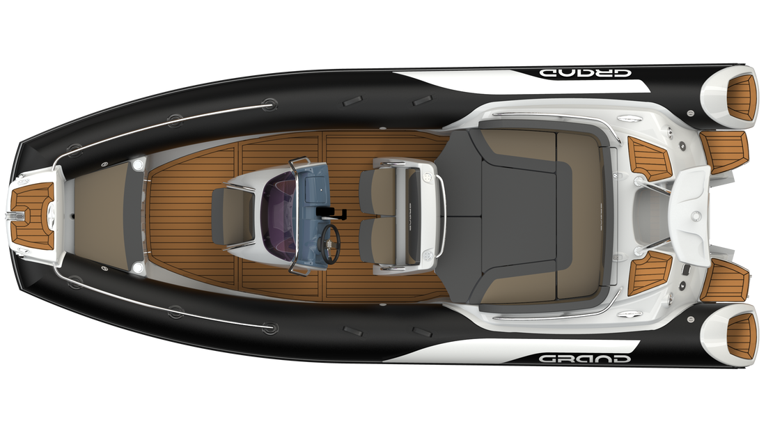 Top-down view of a sleek black-and-white motorboat with a tan deck and seating.